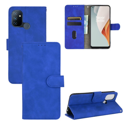 Solid Color Skin Feel Magnetic Buckle Horizontal Flip Calf Texture PU Leather Case with Holder & Card Slots & Wallet