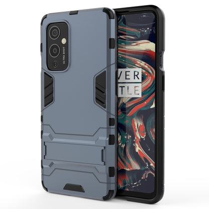 PC + TPU Shockproof Protective Case with Holder, For OnePlus 9, For OPPO Reno5, For Xiaomi Redmi Note 9 5G