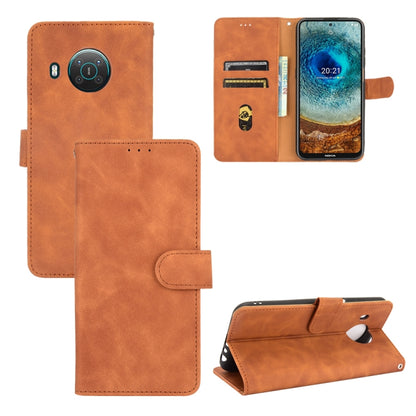 Solid Color Skin Feel Magnetic Buckle Horizontal Flip Calf Texture PU Leather Case with Holder & Card Slots & Wallet, For Fujitsu Be4 Plus F-41B, For Nokia X10, For Sony Xperia 5 III