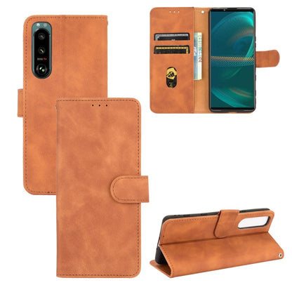 Solid Color Skin Feel Magnetic Buckle Horizontal Flip Calf Texture PU Leather Case with Holder & Card Slots & Wallet