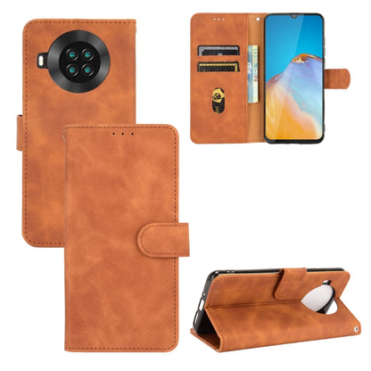 Solid Color Skin Feel Magnetic Buckle Horizontal Flip Calf Texture PU Leather Case with Holder & Card Slots & Wallet