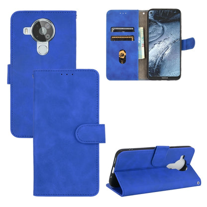 Solid Color Skin Feel Magnetic Buckle Horizontal Flip Calf Texture PU Leather Case with Holder & Card Slots & Wallet