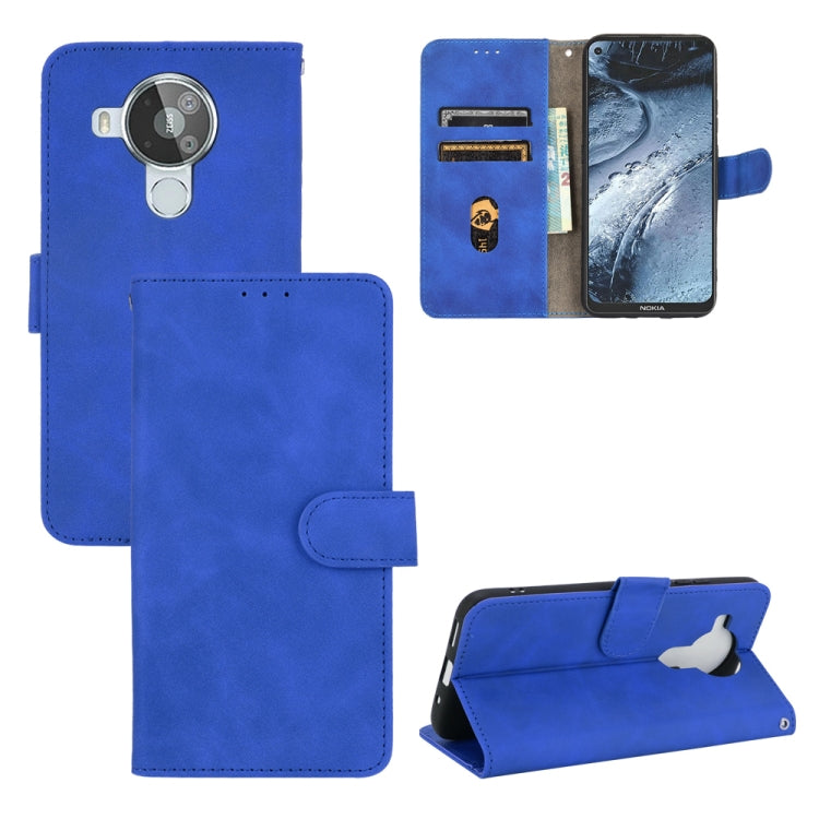 Solid Color Skin Feel Magnetic Buckle Horizontal Flip Calf Texture PU Leather Case with Holder & Card Slots & Wallet