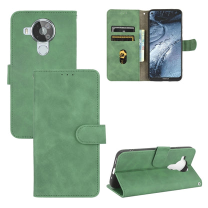 Solid Color Skin Feel Magnetic Buckle Horizontal Flip Calf Texture PU Leather Case with Holder & Card Slots & Wallet