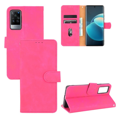 Solid Color Skin Feel Magnetic Buckle Horizontal Flip Calf Texture PU Leather Case with Holder & Card Slots & Wallet