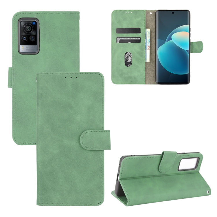 Solid Color Skin Feel Magnetic Buckle Horizontal Flip Calf Texture PU Leather Case with Holder & Card Slots & Wallet