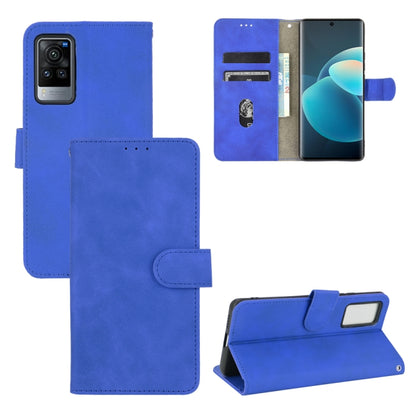 Solid Color Skin Feel Magnetic Buckle Horizontal Flip Calf Texture PU Leather Case with Holder & Card Slots & Wallet