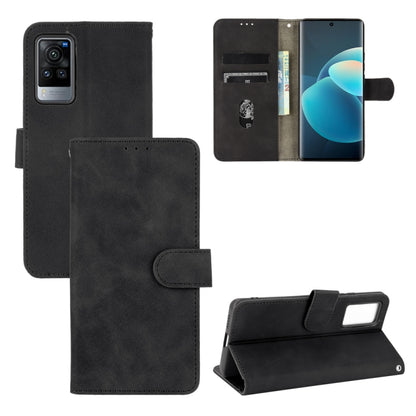 Solid Color Skin Feel Magnetic Buckle Horizontal Flip Calf Texture PU Leather Case with Holder & Card Slots & Wallet