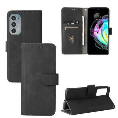 Solid Color Skin Feel Magnetic Buckle Horizontal Flip Calf Texture PU Leather Case with Holder & Card Slots & Wallet