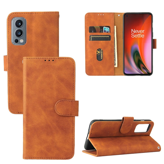 Solid Color Skin Feel Magnetic Buckle Horizontal Flip Calf Texture PU Leather Case with Holder & Card Slots & Wallet