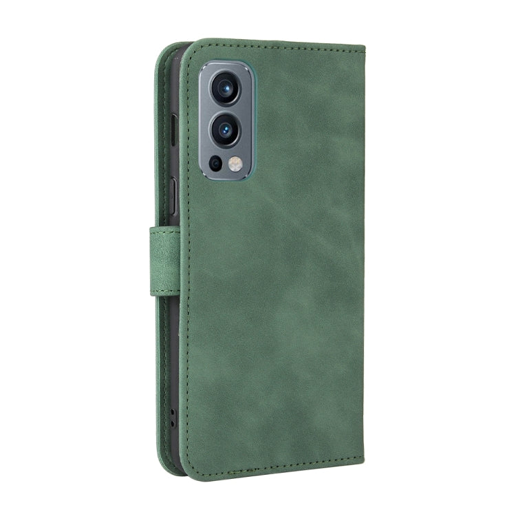 Solid Color Skin Feel Magnetic Buckle Horizontal Flip Calf Texture PU Leather Case with Holder & Card Slots & Wallet, For OnePlus Nord 2 5G