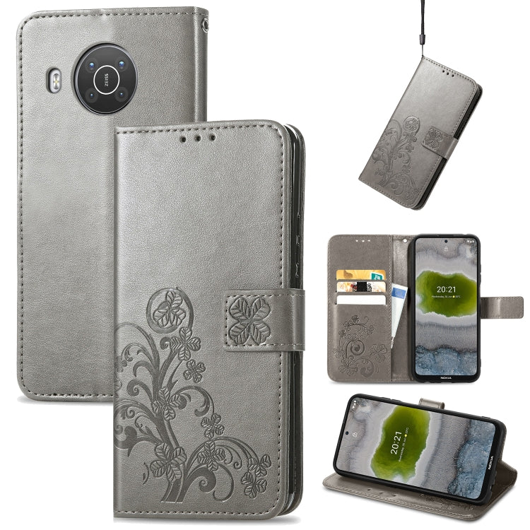 Four-leaf Clasp Embossed Leather Phone Case