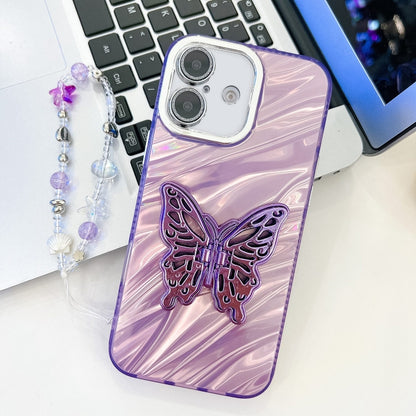 Plating Glitter Lens Film Texture Butterfly Holder Wristband Phone Case, For iPhone 16 Plus